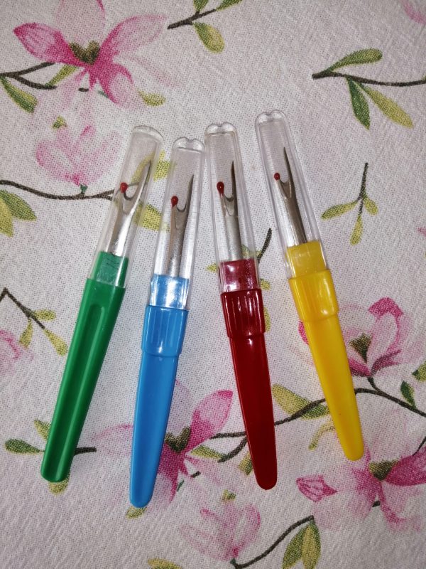 Rompe Costura de Colores de Plástico.